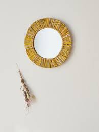 Reflective mirrors are perfect for embellishing; Round Mirror In Two Tone Sea Grass Yellow Natural Home