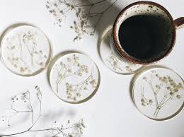 Warming resin in a warm water will help reduce bubbles in the mix. Resin Coasters With Dried Flowers Set Of Four Babies Breath Home Living Home Decor Kitchen Dining Housewares Functional Art Resin Jewelry Diy Resin Jewelry Resin Jewelry Making