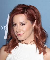 And yes, we agree it's totally unfair, because it's been a decade, and she's a real human being, and blah, blah, blah. Ashley Tisdale Medium Wavy Dark Burgundy Red Hairstyle