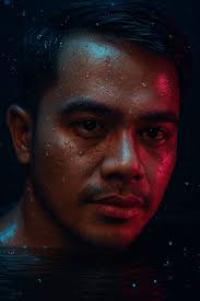 A very realistic and highly detailed close-up shot of a young Indonesian or  Asian man with a joyful, excited expression, holding a modern smartphone to  take a selfie while positioned inside the