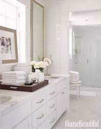 White bathroom ideas aren't complete without a veil of white tiles to adorn your bathroom walls and flooring. 15 Bathrooms That Prove All White Is Still Totally In All White Bathroom Classic Bathroom Best Bathroom Designs