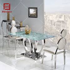 Looking to spruce up your dining area? China Luxury Modern Stainless Steel Glass Wedding Table And Chairs Set For Dining Room China Wedding Table Dining Table