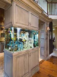It's designed to be easily hung from the inside of the wall rather than the outside. 8 Extremely Interesting Places To Put An Aquarium In Your Home