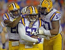 Advocate Staff Photo By Bill Feig Lsu Safety Jalen Mills 28 And Lsu Defensive Tackle Davon Godchaux 57 Converge On Lsu Tigers Football Lsu Lsu Football