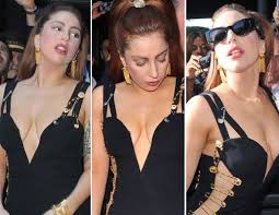 Elizabeth hurley wearing the iconic gianni versace safety pin dress, pic: Lady Gaga Imitates Liz Hurley Donning Iconic Versace Safety Pin Gown Celebrity News Showbiz Tv Express Co Uk