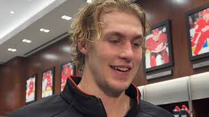 Simon Edvinsson rises from the ice, scores winning goal for Red Wings