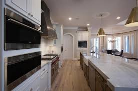 We don't see decorations or sink unit. Kitchen Island Sink With Two Dishwashers Transitional Kitchen