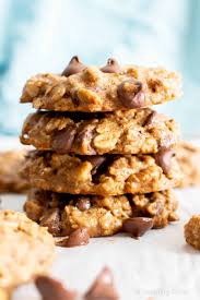 In a medium size bowl add both flours, oat meal,salt, baking soda & cinnamon, stir together & set aside till needed. Easy Healthy Oatmeal Chocolate Chip Cookies Recipe Beaming Baker