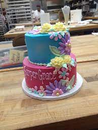 Pink And Blue Stacked Flower Cake From Julia S Bakery In Murfreesboro Tn Flower Cake Cake Bakery