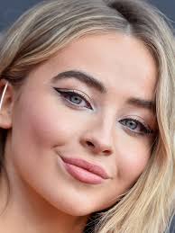 Sabrina Carpenter Wears Bright Red Hair For New Movie See Photos Allure
