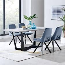 If you live in a home with pets and children, stick with durable fabrics like microfiber that you can easily wipe down. Lexi Dining Room Accent Chair In Blue Velvet And Black Finish Lclesiblu