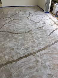 The Garage Floor Co Getting Ready For The First Epoxy Primer Coat After Fixing Cracks And Grinding The Concrete Epoxy Floor Garage Floor Metallic Epoxy Floor