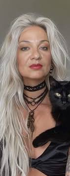 Can someone open the lady's brown eyes?