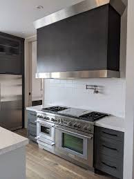 33 x 47 wood metal cabinet in sleek black finish, features rustic dimensional design in gray, brown and beige finish, in rectangular frame with 2 cabinet doors and 2 minimalist knobs, features 4 connected stands, made from iron, chinese fir. Hammersmith Custom Kitchen Large Range Wall Accent Custom Kitchen Rustic Wood Floors Blue Gray Cabinets