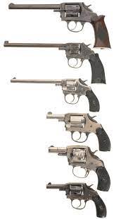 These guns use a single top latch to hold the revolver together, a simple design which boasts four patent dates listed on the barrel with the last one being '93. Six Double Action Revolvers A Iver Johnson Model 1900 Target Revolver