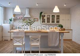 The ultimate guide to decorate in scandinavian style! Interior Of Modern White Kitchen In Scandinavian Style Open Shelves In The Kitchen With Plants And Jars Canstock