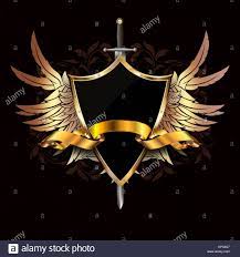 medieval shield with gold wings gold ribbon and sword on dark grunge background with patterns stock photo medieval shields dark grunge medieval knight