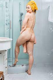Young Charming Naked Woman Wiping Herself With Bath Towel In Bathroom Stock  Photo, Picture and Royalty Free Image. Image 59073704.