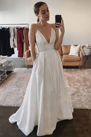 A Line Spaghetti Straps Backless White Satin Wedding Dress With Pockets Weddingdress Simple Bridal Dresses Wedding Dresses With Straps Wedding Dresses Satin
