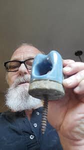 What is wrong with this clock? Answers from collectors with two years of  experience or less... PLEASE. It is a popular seller