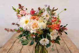 By summer of 2019, poppy's first bride walked down the aisle. Hand Tied Bridal Bouquet Blooming Green Seasonal British Wedding Flowers