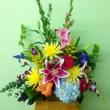 Maybe you would like to learn more about one of these? Bright Colors Hydrangeas Spider Mums Bells Of Ireland Stargazer Lilies Love This Combination Made By House Of Fl Stargazer Lily Spider Mums Floral Wreath