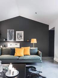 This brilliant living room makeover proves just how stunning this brooding shade can be. 15 Enviable Black Feature Walls Living Room Decor Gray Living Room Color Black Living Room