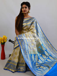 Banarasee Handwoven Buta Design Blue Floral Border Art Silk Saree Of Pure silk sarees are usually made with mulberry silk for its tensile strength and longevity. banarasee handwoven buta design blue floral border art silk saree off white