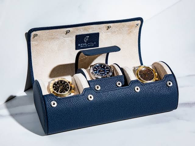 BezelHold leather watch roll with three luxury timepieces, AI generated