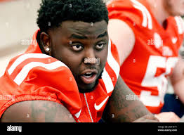 Mississippi offensive lineman Greg Little speaks during the NCAA college  football team's media day Wednesday, Aug. 2, 2017, in Oxford, Miss. (AP  Photo/Rogelio V. Solis Stock Photo