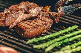 Learn everything you need to know about charcoal grilling. Italian Meat Market Perfectly Grilled New York Strip Steak Asparagus