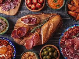 Pass around a spread of spanish small plates for a summer dinner party that's lighter, more casual, and most definitely more fun. Tapas Dinner Hen Party In Seville