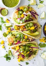 Combine the rest of the lime juice with the mango, cilantro, jalapeno pepper, onion, and black pepper to taste. Grilled Fish Tacos With Mango Salsa L Joyful Healthy Eats