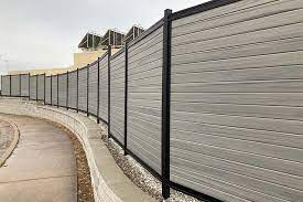 Fence on top of a wall. How To Build A Retaining Wall Fence A Complete Guide