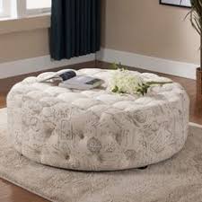 It features a durable metal frame and four storage ottomans that are also finished in neutral black color. 25 Best Round Ottoman Ideas Round Ottoman Ottoman Padded Stool