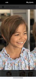 Who can give a short haircut to a 6-year-old girl in the  Marinette/Menominee area?