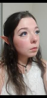 One YEAR with our new EAR !👂🏻” and festive Halloween hair too! Looking  GREAT, Miss Daisy! 🌼