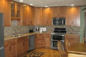 Oak Mission Kitchen Cabinets In The Dayton Door Style Were Used In This Kitchen From Cliqstudios Contemporary Oak Kitchen Oak Kitchen Cabinets Kitchen Colors