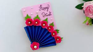 If you want premium looking handmade diwali cards, you cannot go wrong with this stunning greeting card laced with golden beads and acrylic gems. Diy Diwali Greeting Card Handmade Diwali Card Making Ideas How To Ma Diwali Card Making Diwali Cards Birthday Cards Diy