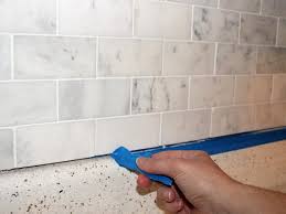 how to install a marble tile backsplash
