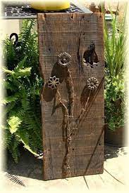 With barn board fences, you get to choose what kind of an appearance you want. Barbed Wire Beyond The Ranch Cowgirl Magazine Barn Wood Crafts Barn Wood Projects Barn Wood