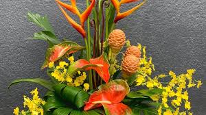 Each and every dress we offer from formal dresses, casual dresses or evening dresses styles with floral prints and colorful island themes. Tropical Flower Arrangement Florists Review