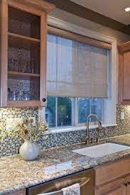Keeping kitchen window treatments clean is a must. Pin By Janet Devera On Solar Shades Kitchen Sink Window Window Shades Living Room Kitchen Sink Decor