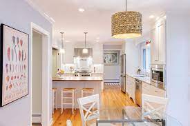 This initial visit would have put off most buyers, but the jordans were totally sold on the idea of turning this 1930s colonial revival into a permanent home for themselves (both durham, north carolina, natives) and their three children. Center Hall Colonial Redo First Floor Traditional Kitchen New York By Corinthian Builders Houzz