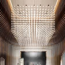 Chandeliers add a bit of drama, they can make any space feel cozier and provide a modern and luxurious feel. Led Light Cube Chandelier Hotel Project Lobby Customized Large Scale Chandelier Glf 01 Modern Lighting Manufacturer