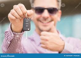 Man Holding Keys Thumbs Up Stock Photos