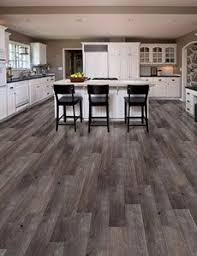 Home Legend Syncorex Heatherstone 7 1 16 Hardwood And Laminate Flooring By Mohawk Anderson And More Grey Vinyl Plank Flooring House Flooring Flooring