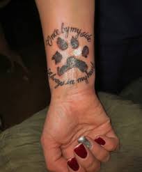 Dog paw print tattoo with flowers. 40 Paw Print Flower Tattoo Ideas Pawprint Tattoo Paw Tattoo Tattoos