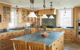 A kitchen with this countertop can achieve an aesthetic that highly complements oak cabinets. 14 Soapstone Countertops To Inspire Your Kitchen Design