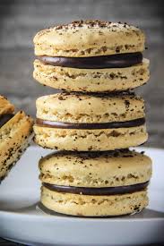 This tasty macarons recipe will produce delicate cookies with a sweet, creamy filling you'll adore. Coffee Macaron Recipe Simply Home Cooked